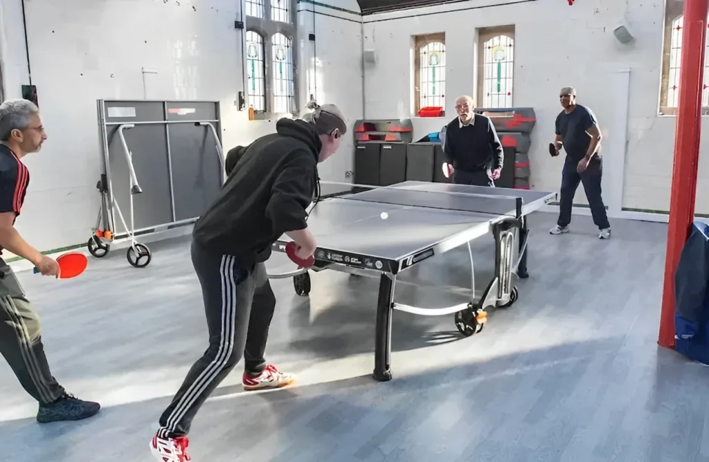 Poeple playing Ping Pong at Withington baths